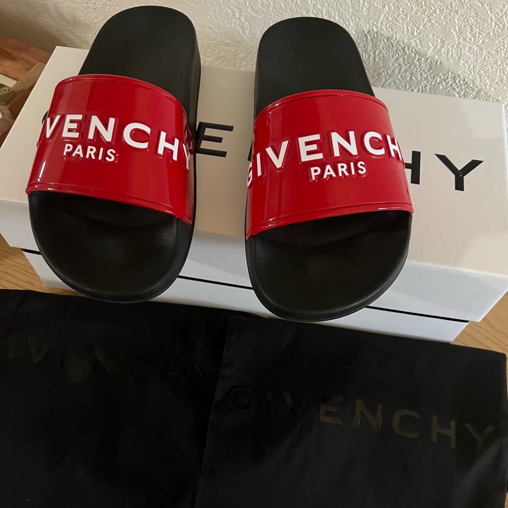Red Givenchy slides in great condition. Includes box and two Givenchy cloth bags